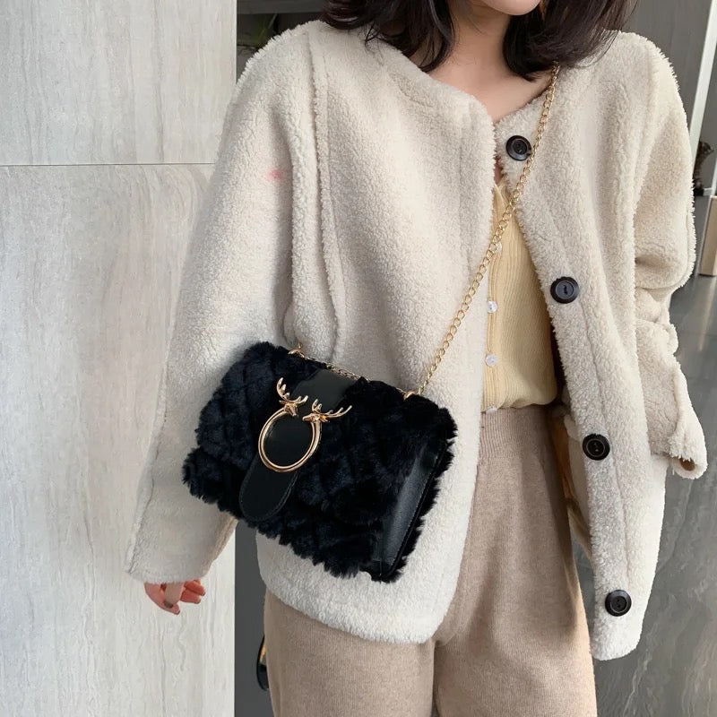 Black fur with gold decor bag