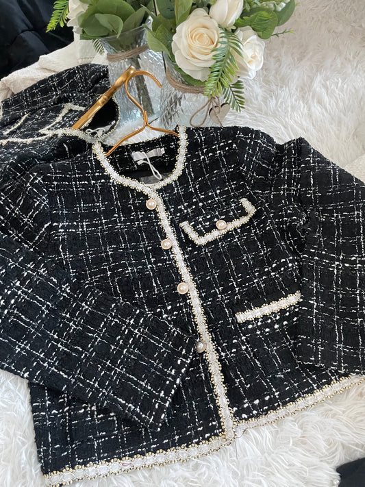 Black tweed jacket with pearl button