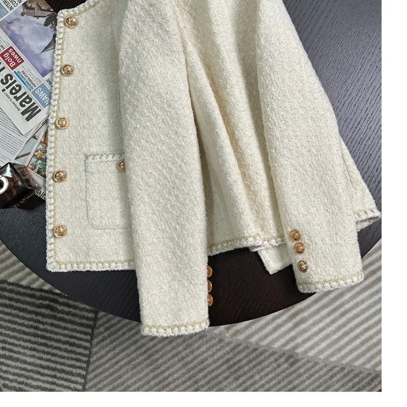 White tweed jacket with gold button
